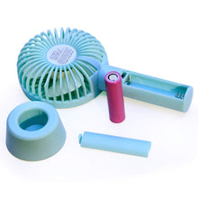 Multi-functional handheld fan for indoor and outdoor use.