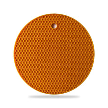 Hot mat made from silicone, showing its ability to handle high temperatures.