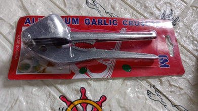 Garlic press with ergonomic design for easy handling