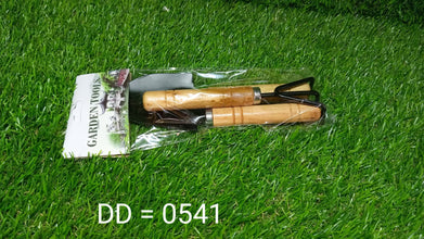 Small garden tool set, hand cultivator, trowel, and fork, ideal for planting and garden care.